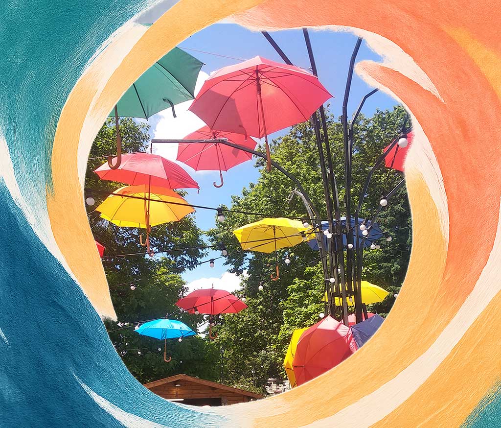 Sunny decoration, colourful umbrellas hanging